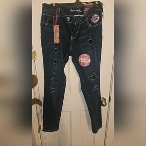 Amethyst jeans with distressing black sequins